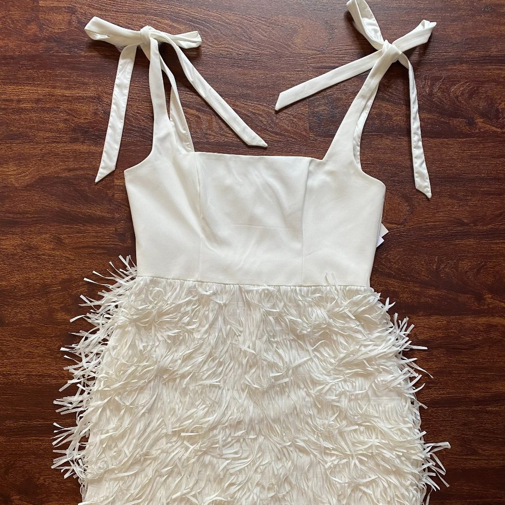 Adrianna Papell flirty white bachelorette dress w tie straps & fluttery bottom